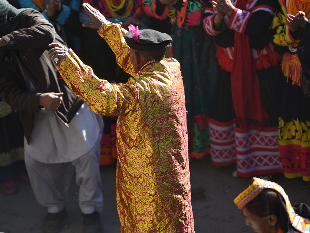 The Kalash come together to sing and dance